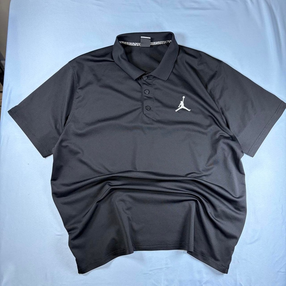 Black and gray Jordan Golf polo shirt